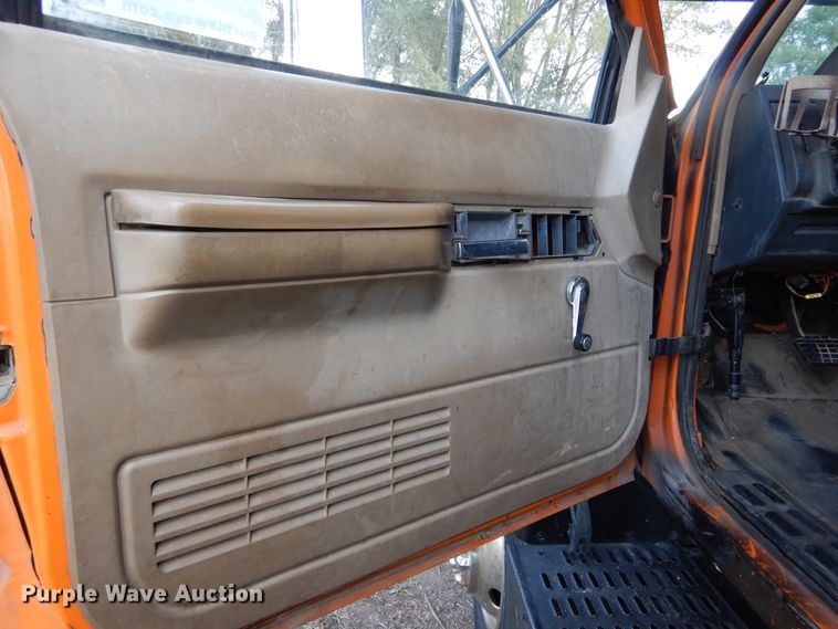 image for item DL6447 1999 GMC C7500  bucket truck