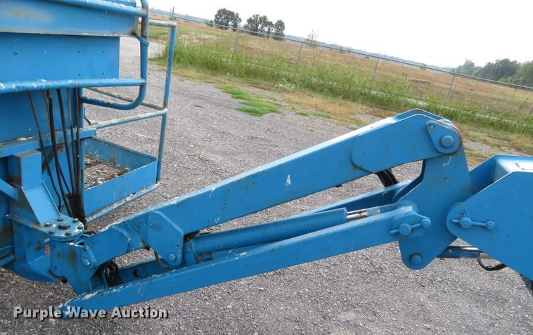 image for item DN7771 1999 Genie S-65  boom lift