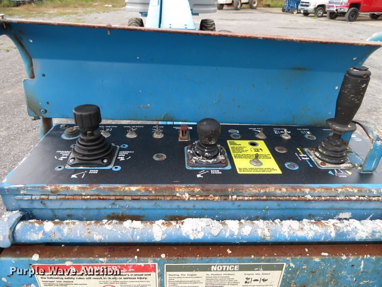 image for item DN7771 1999 Genie S-65  boom lift