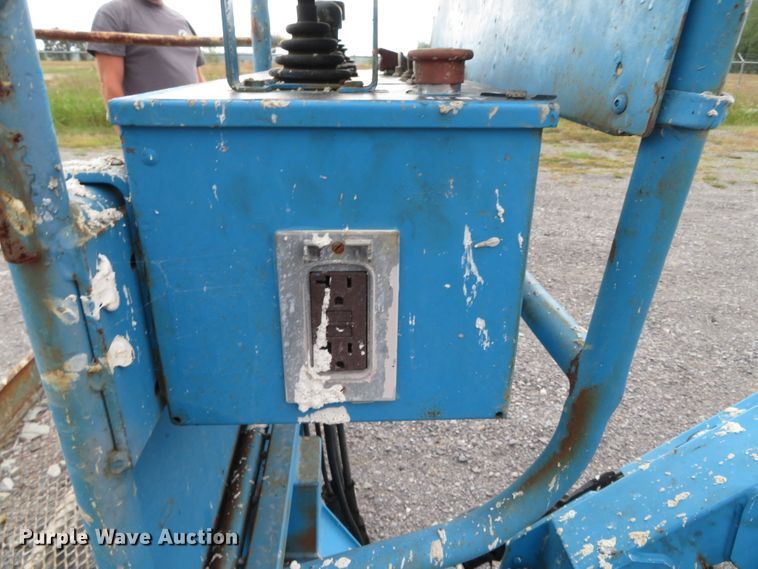 image for item DN7771 1999 Genie S-65  boom lift