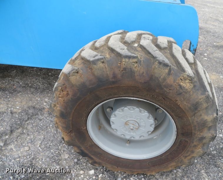 image for item DN7771 1999 Genie S-65  boom lift