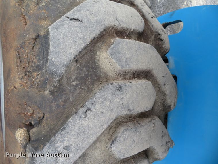 image for item DN7771 1999 Genie S-65  boom lift