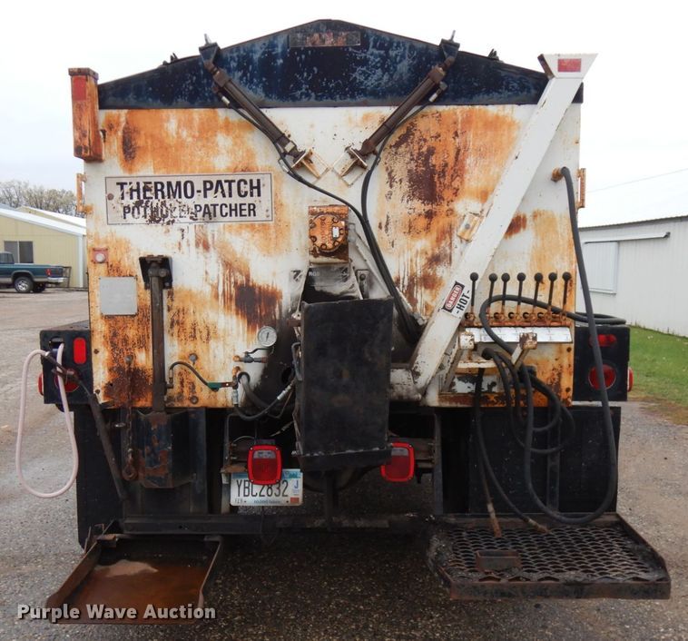 image for item JS9528 1991 Ford F700  pot hole patcher truck