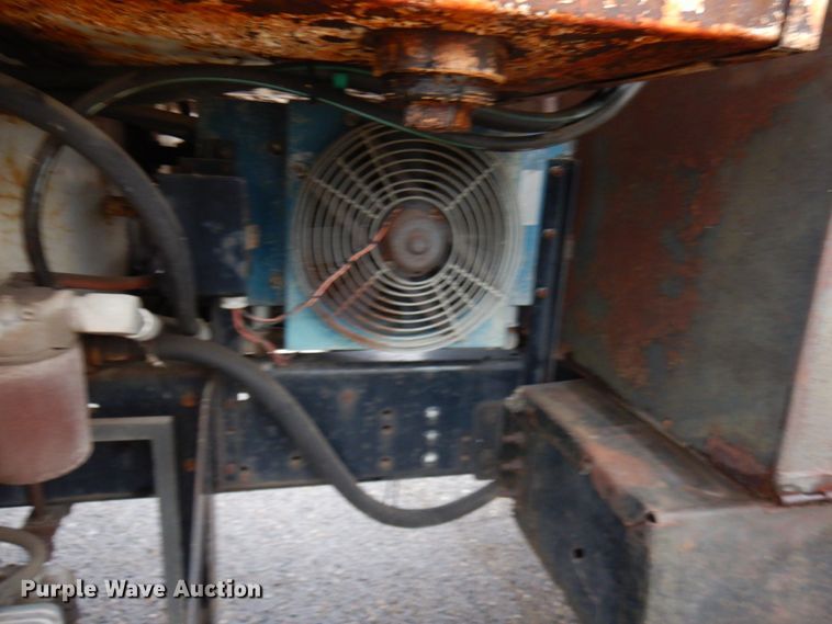 image for item JS9528 1991 Ford F700  pot hole patcher truck