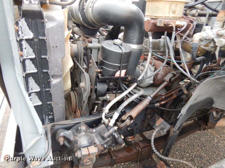 image for item JS9528 1991 Ford F700  pot hole patcher truck