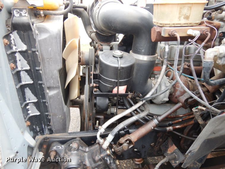 image for item JS9528 1991 Ford F700  pot hole patcher truck