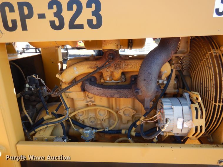 image for item JZ9800 1994 Caterpillar CP-323  single drum vibratory roller