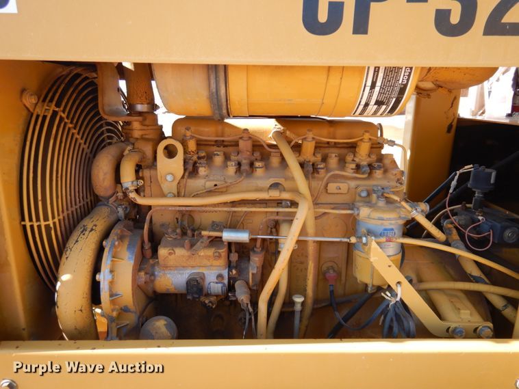 image for item JZ9800 1994 Caterpillar CP-323  single drum vibratory roller