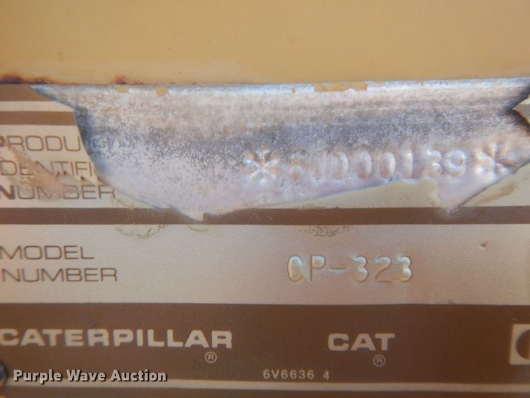 image for item JZ9800 1994 Caterpillar CP-323  single drum vibratory roller