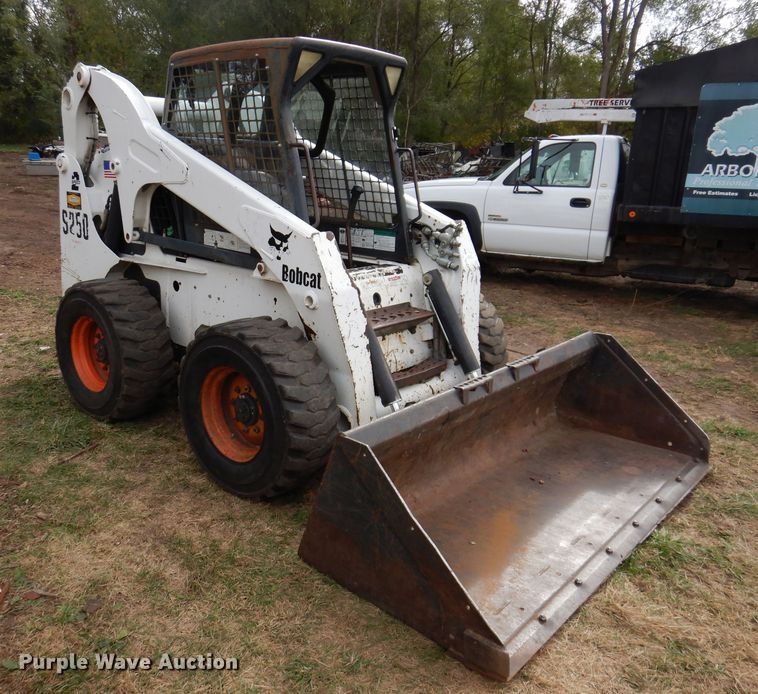 image for item KA9459 2002 Bobcat S250  skid steer loader