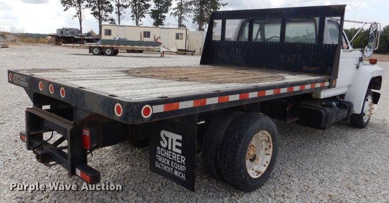 image for item KA9470 1993 Ford F700  flatbed truck