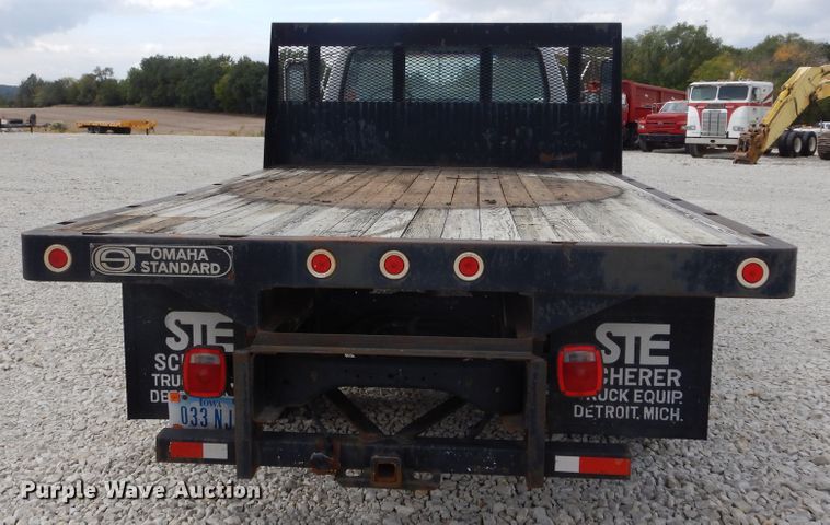 image for item KA9470 1993 Ford F700  flatbed truck