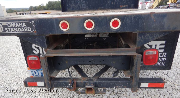 image for item KA9470 1993 Ford F700  flatbed truck