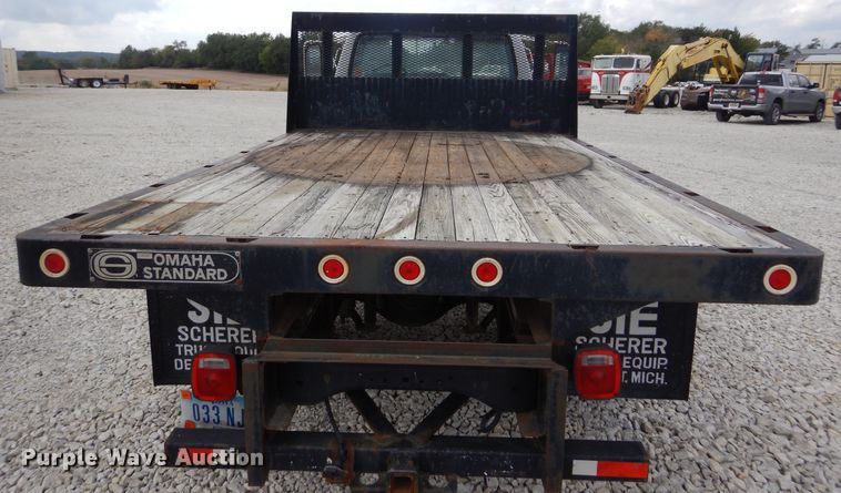 image for item KA9470 1993 Ford F700  flatbed truck