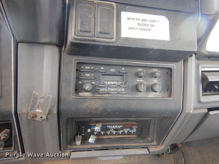 image for item KA9470 1993 Ford F700  flatbed truck