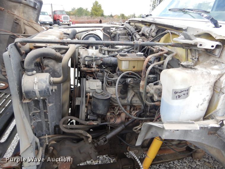 image for item KA9470 1993 Ford F700  flatbed truck