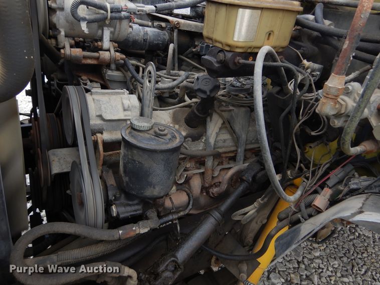 image for item KA9470 1993 Ford F700  flatbed truck