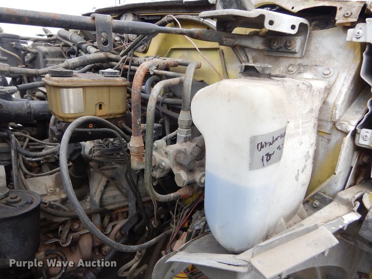 image for item KA9470 1993 Ford F700  flatbed truck