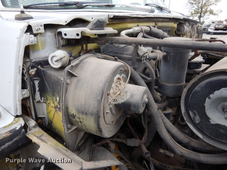 image for item KA9470 1993 Ford F700  flatbed truck