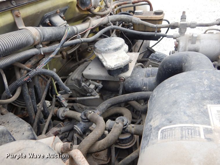 image for item KA9470 1993 Ford F700  flatbed truck