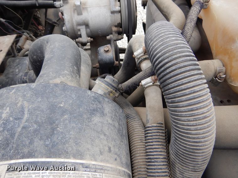 image for item KA9470 1993 Ford F700  flatbed truck