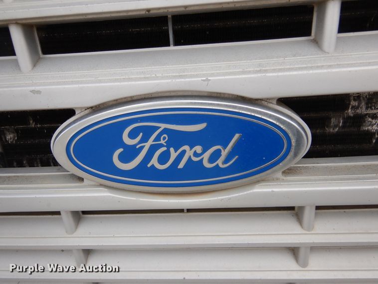 image for item KA9470 1993 Ford F700  flatbed truck