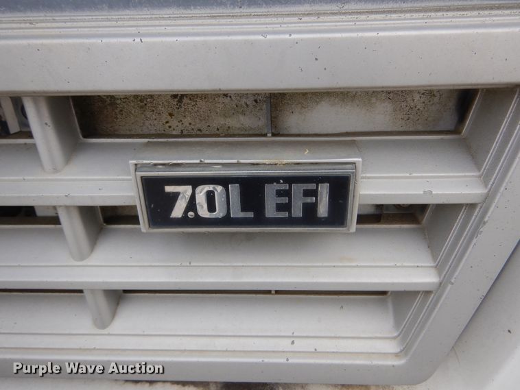 image for item KA9470 1993 Ford F700  flatbed truck