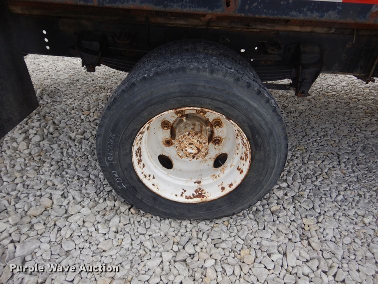 image for item KA9470 1993 Ford F700  flatbed truck