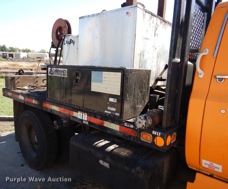 image for item KA9594 1987 GMC Sierra  flatbed truck