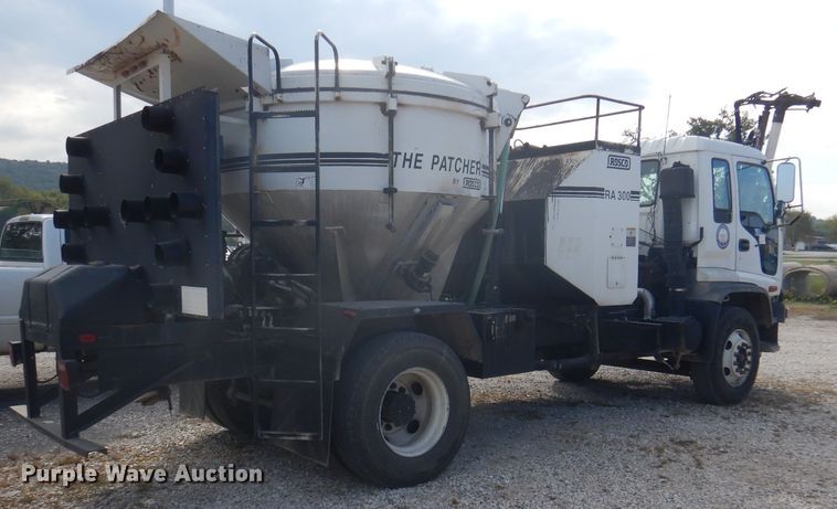 image for item DA5447 1998 GMC T6500  pothole patcher truck