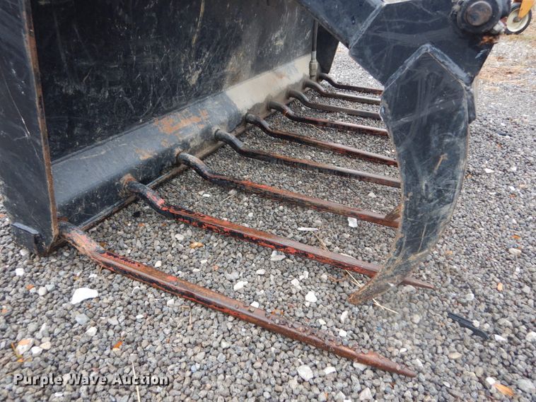 image for item JF9928 S&H  skid steer grapple bucket