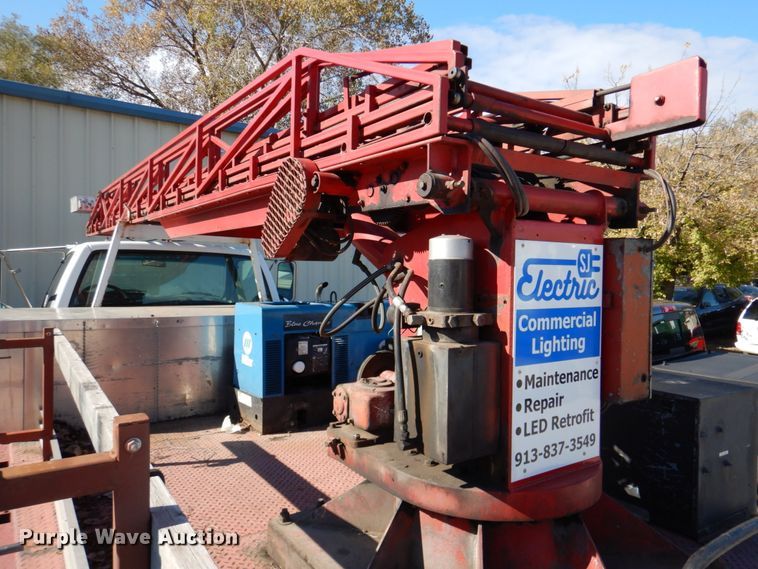 image for item DK1277 1995 Chevrolet Kodiak  flatbed truck with boom ladder