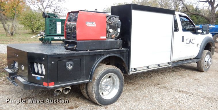 image for item DK3108 2012 Ford F550 Super Duty XLT  SuperCab flatbed truck