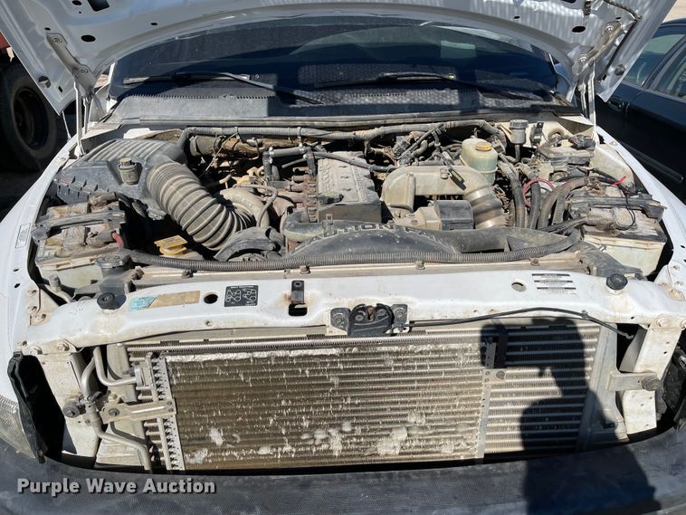 image for item IK9585 2002 Dodge Ram 3500  flatbed pickup truck