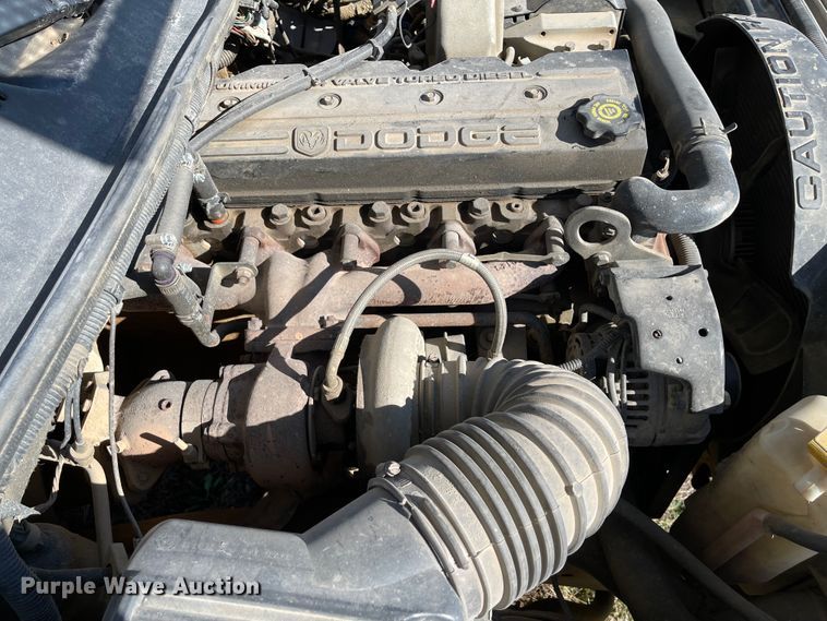 image for item IK9585 2002 Dodge Ram 3500  flatbed pickup truck