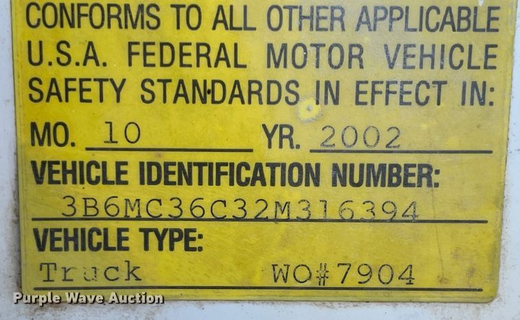 image for item IK9585 2002 Dodge Ram 3500  flatbed pickup truck