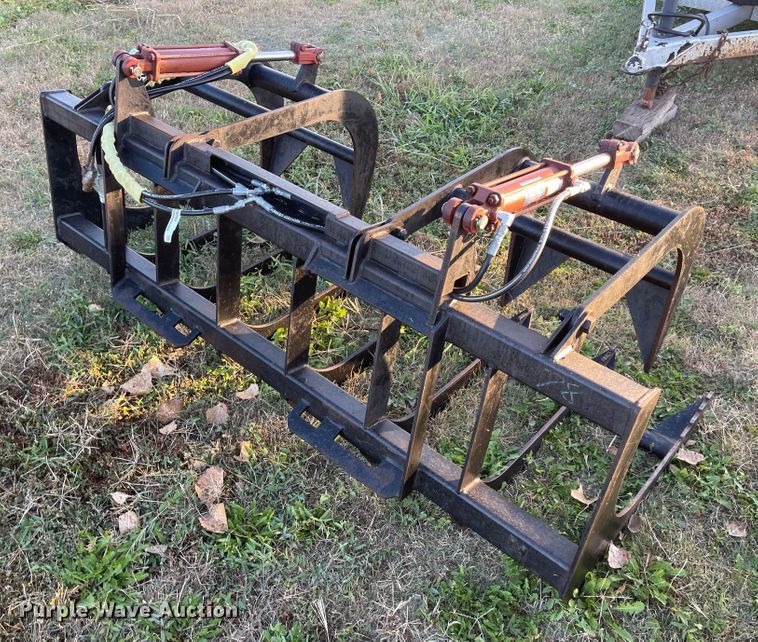 image for item IK9587 77"W skid steer rock grapple bucket