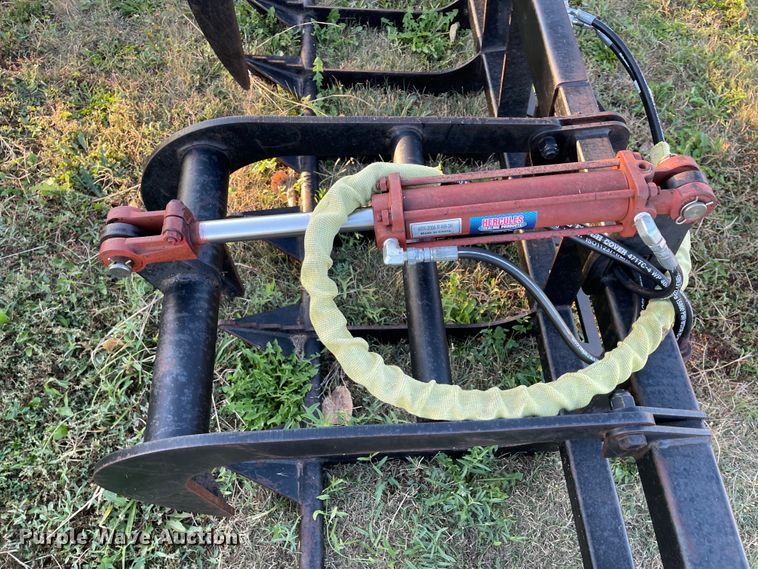 image for item IK9587 77"W skid steer rock grapple bucket