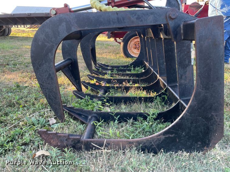 image for item IK9587 77"W skid steer rock grapple bucket