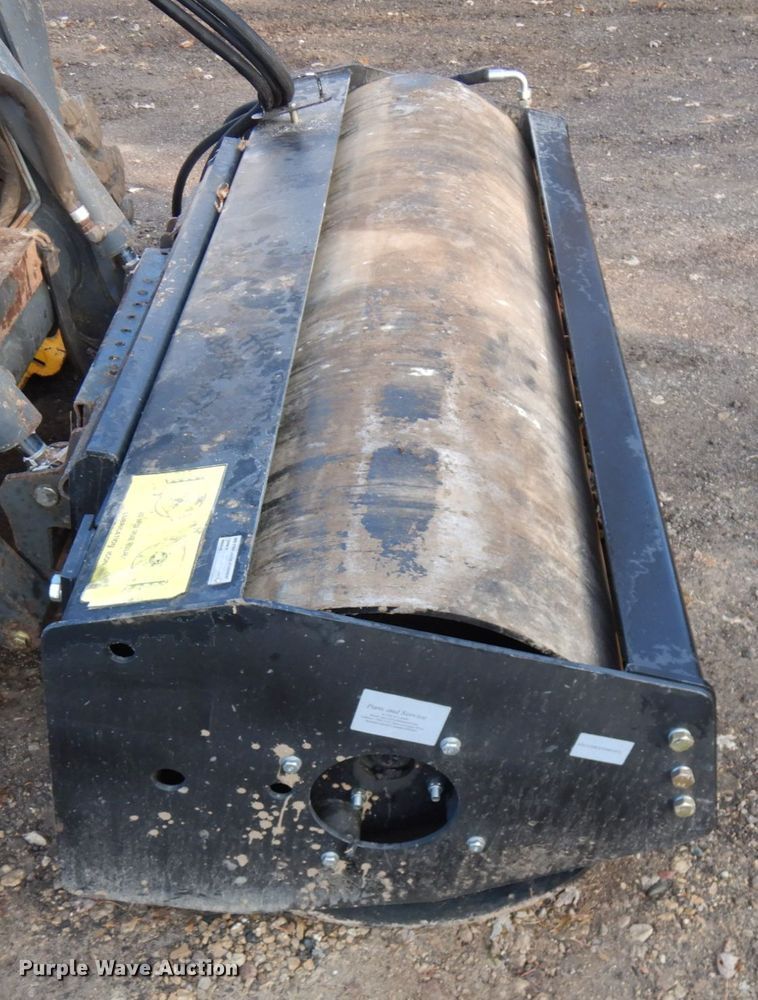 image for item KK9778 Wolverine  73"W skid steer smooth drum vibratory roller