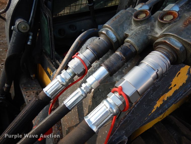 image for item KK9778 Wolverine  73"W skid steer smooth drum vibratory roller