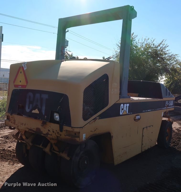 image for item DJ2429 1999 Caterpillar PS-150B  pneumatic roller