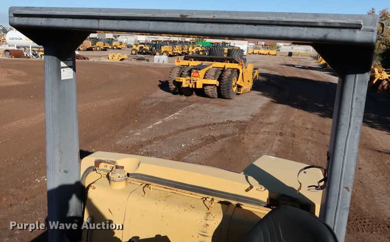 image for item DJ2429 1999 Caterpillar PS-150B  pneumatic roller