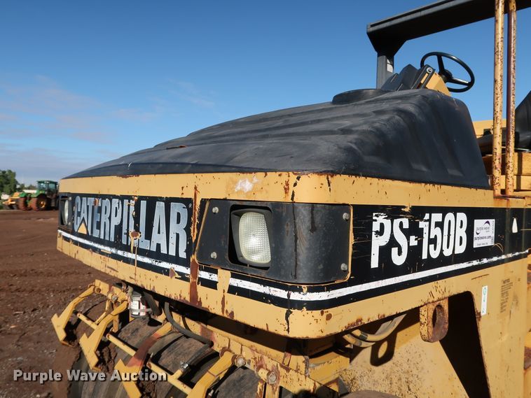 image for item DJ2429 1999 Caterpillar PS-150B  pneumatic roller