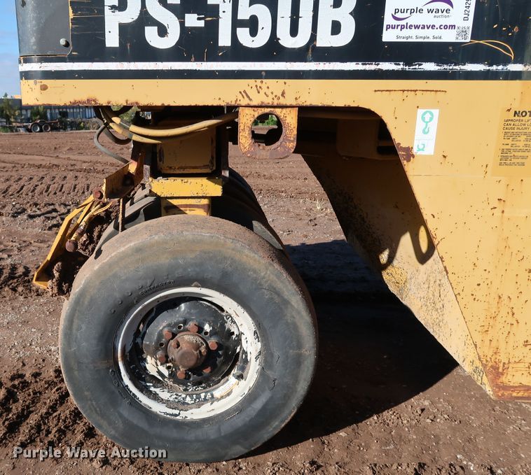 image for item DJ2429 1999 Caterpillar PS-150B  pneumatic roller