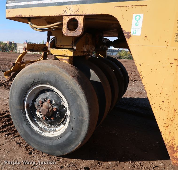image for item DJ2429 1999 Caterpillar PS-150B  pneumatic roller