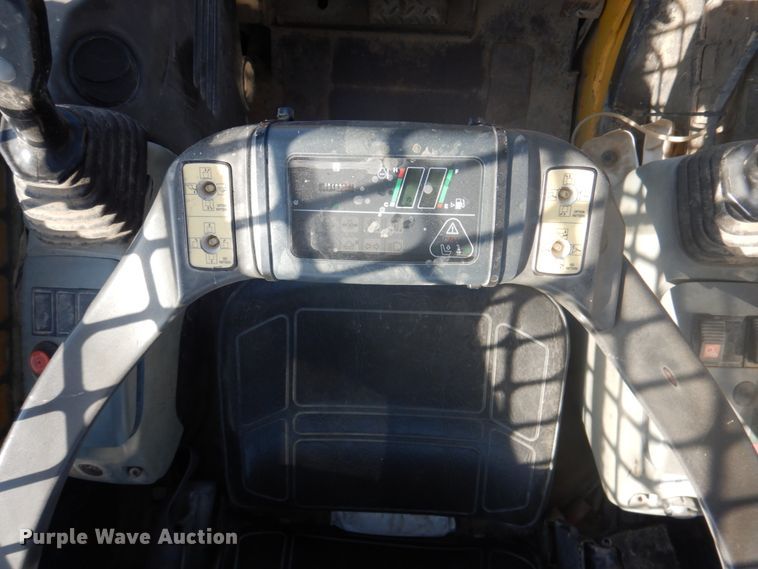 image for item DK1338 2004 Komatsu SK1020T  skid steer loader