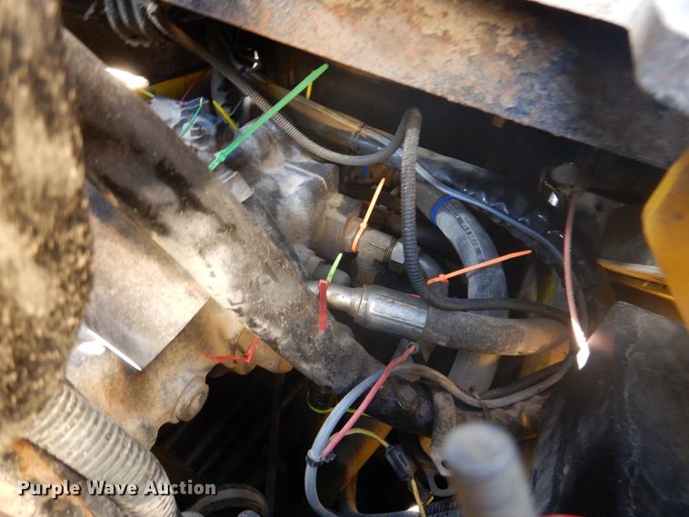 image for item DK1338 2004 Komatsu SK1020T  skid steer loader