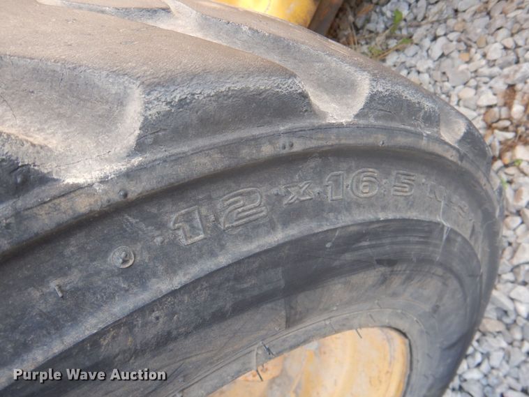 image for item DK1338 2004 Komatsu SK1020T  skid steer loader