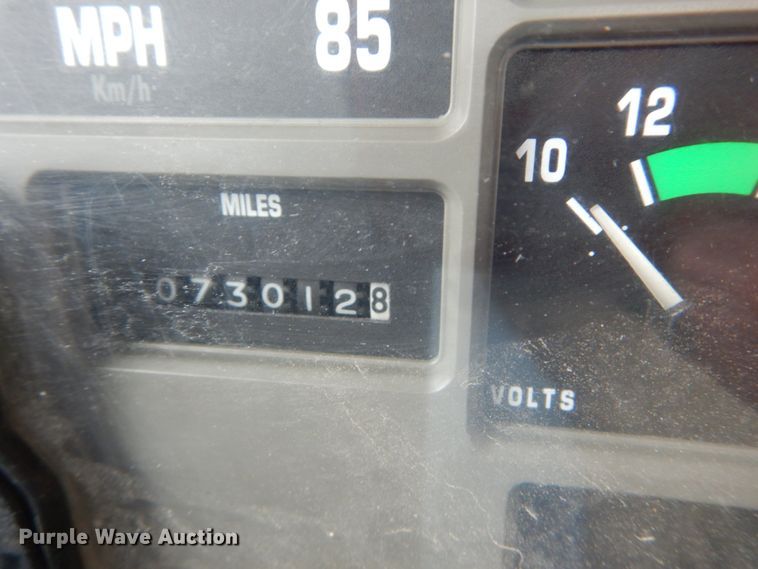 image for item IV9503 2001 International 4700  flatbed truck with mud mixer